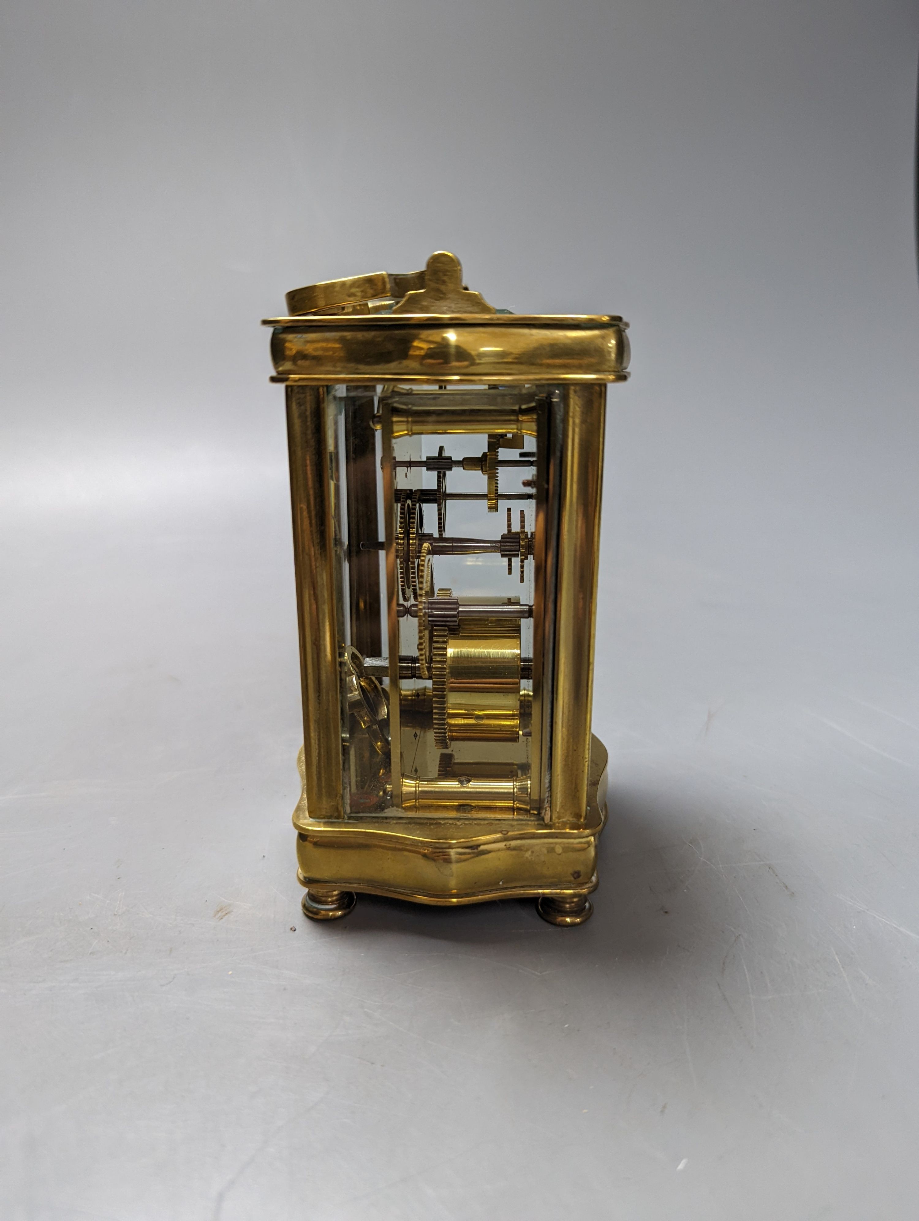 A brass cased carriage timepiece